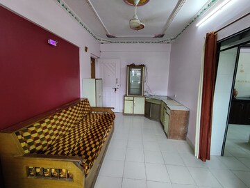 Living Room in 1 BHK Apartment at Mandakini CHS, Dahisar East – for Rent