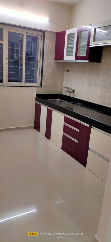 Kitchen in 1 BHK Apartment at Millennium Acropolis, Wakad – for Sale