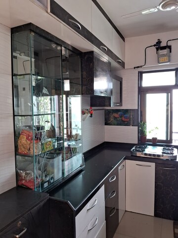 Kitchen in 1 BHK Apartment at Neptune Living Point, Bhandup West – for Rent
