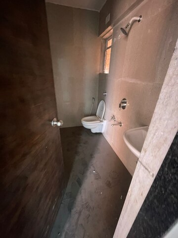 Bathroom in 2 BHK Apartment at Cosmos Habitat, Majiwada – for Rent