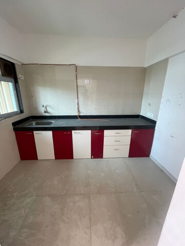 Kitchen in 2 BHK Apartment at Cosmos Habitat, Majiwada – for Rent