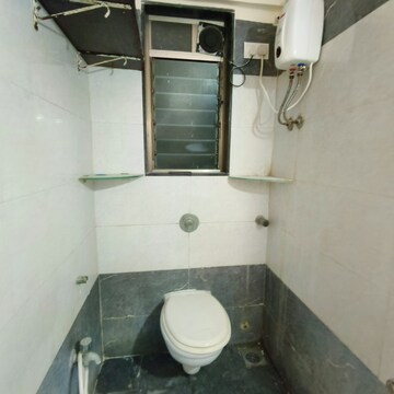 Bathroom in 2 BHK Apartment at Omkar Signet, Malad East – for Rent