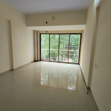 Room in 2 BHK Apartment at Omkar Signet, Malad East – for Rent
