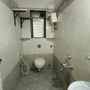 Bathroom in 2 BHK Apartment at Omkar Signet, Malad East – for Rent