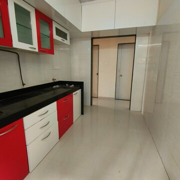 Kitchen in 2.5 BHK Apartment at Omkar Signet, Malad East – for Rent