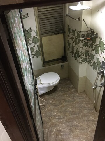 Bathroom in 2 BHK Apartment at Orchid Gaurav Valley, Mira Road – for Rent
