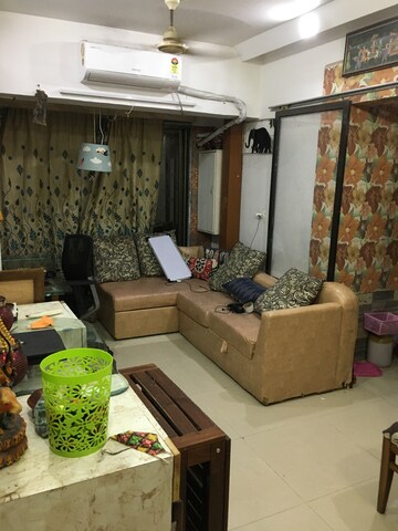 Living Room in 2 BHK Apartment at Orchid Gaurav Valley, Mira Road – for Rent