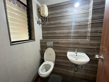 Bathroom in 2 BHK Apartment at Lodha Lakeshore Greens, Dombivli East – for Rent