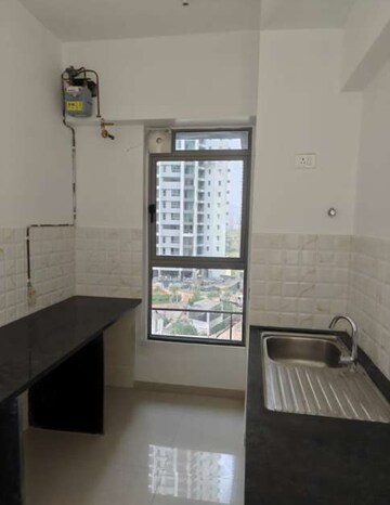 Kitchen in 3 BHK Apartment at Kalpataru Immensa, Kolshet Road – for Rent
