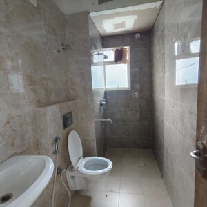 Bathroom in 2 BHK Apartment at Mukul Shanti Garden, Bablatala – for Sale
