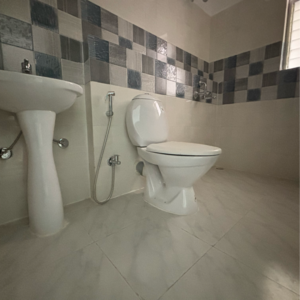 Bathroom in 2 BHK Apartment at Sunland Residency, Bablatala – for Sale