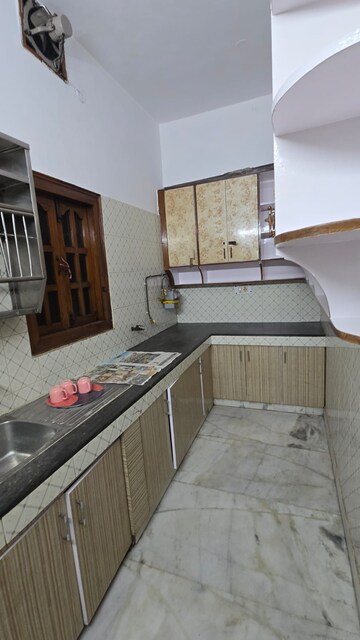 Kitchen in 3 BHK Builder Floor at South Extension ii – for Rent