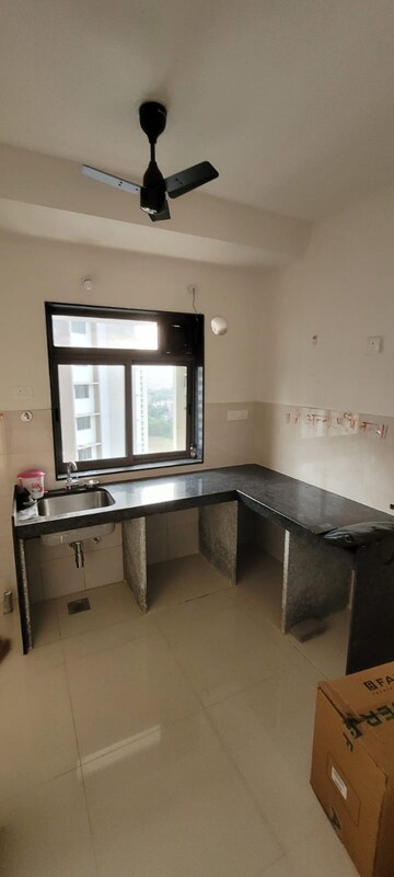 Kitchen in 2 BHK Apartment at Runwal Eirene, Balkum Pada – for Rent
