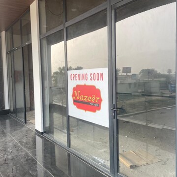 Building Lobby in  Showroom at New Aster Plaza, International Airport Road – for Rent