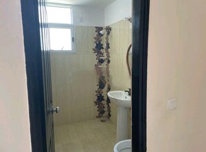 Bathroom in 3 BHK Apartment at Prateek Wisteria, Sector 77 – for Sale