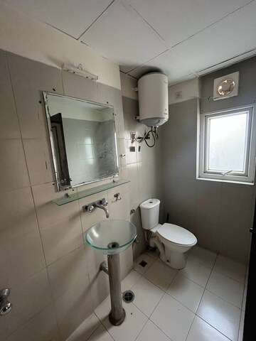 Bathroom in 3 BHK Apartment at Orchid Petals, Sector 49 – for Rent
