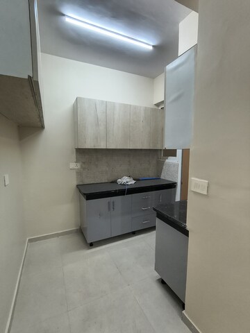 Kitchen in 2 BHK Apartment at Signature The Millennia 2, Sector 37d – for Rent