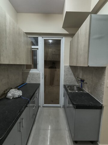 Kitchen in 2 BHK Apartment at Signature The Millennia 2, Sector 37d – for Rent