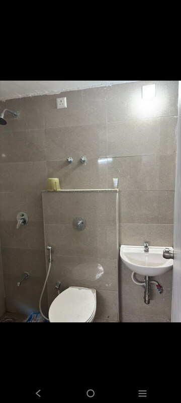Bathroom in 3 BHK Apartment at Goyal Orchid Valley, Shela – for Rent