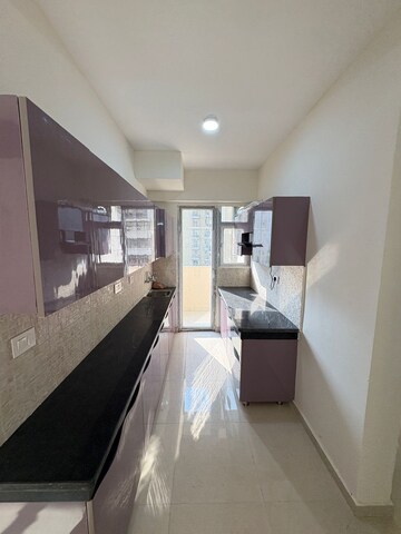 Kitchen in 2 BHK Apartment at Signature The Millennia 2, Sector 37d – for Rent