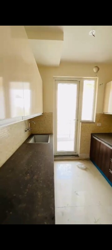 Kitchen in 2 BHK Apartment at Ansal Highland Park, Sector 103 – for Sale