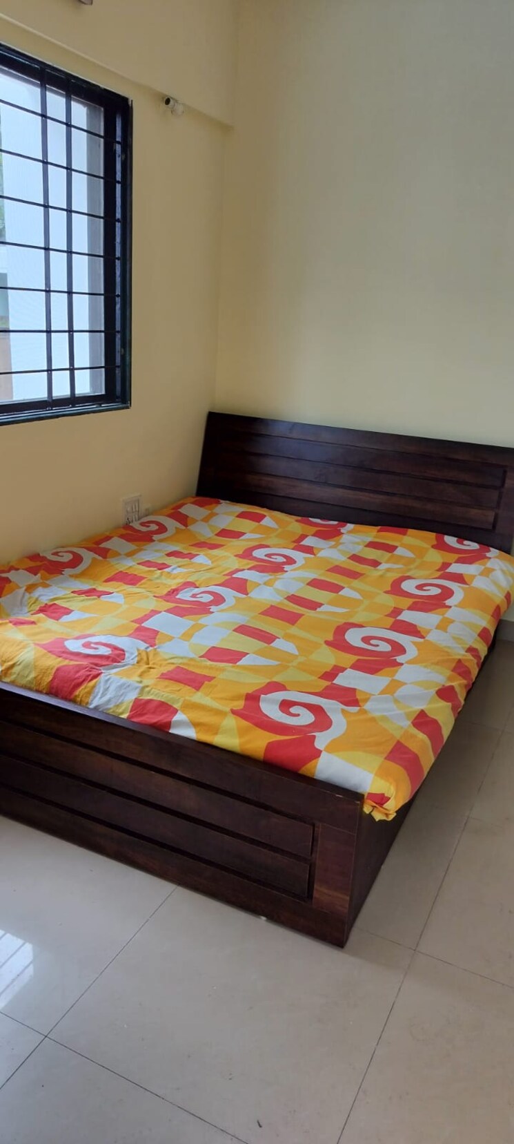 Bedroom, magarpatta-city-cosmos 2 Bedroom 980 Sq.Ft. Apartment In Magarpatta Road Pune 8731184