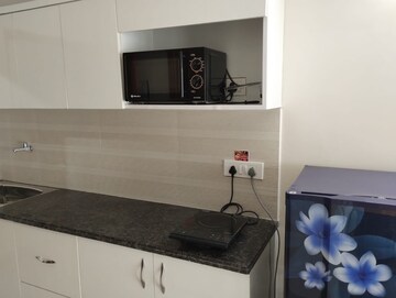 Kitchen in 1 BHK Apartment at Paramount Golfforeste Villas, Zeta I Greater Noida – for Rent