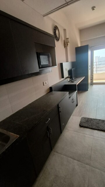 Kitchen in 1 BHK Apartment at Paramount Golfforeste, Zeta I Greater Noida – for Rent