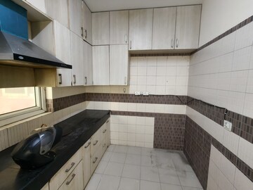 Kitchen in 3 BHK Apartment at Orchid Petals, Sector 49 – for Rent