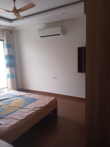 Bedroom in 4 BHK Builder Floor at Ansal Sushant Lok I, Sector 43 – for Rent