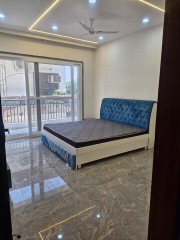Bedroom in 3.5 BHK Builder Floor at Ansal Sushant Lok I, Sector 43 – for Rent