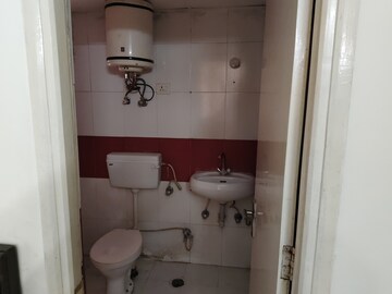 Bathroom in 3 BHK Apartment at Nitishree Aura Chimera, Raj Nagar Extension – for Rent