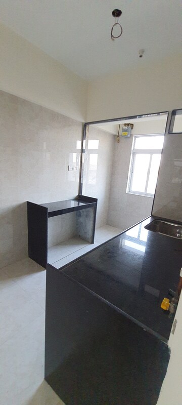 Kitchen in 1 BHK Apartment at Ranuja Ramdev, Bhayandar East – for Sale