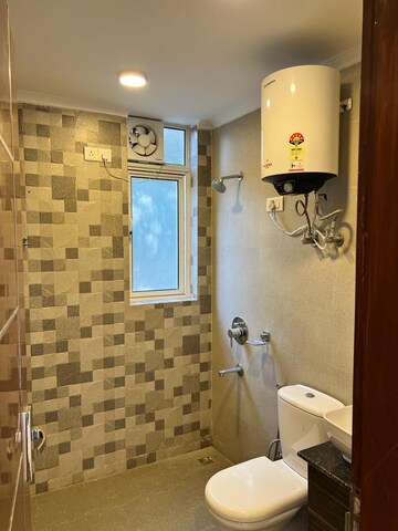 Bathroom in 3.5 BHK Builder Floor at Unitech Woodstock Floors, Sector 50 – for Rent