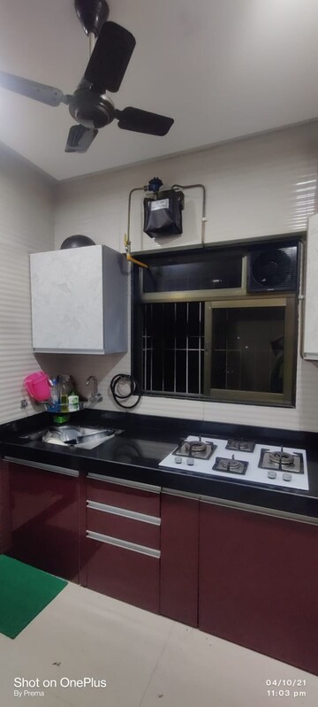 Kitchen in 2 BHK Apartment at Cosmos Jewels Solitaire, Ghodbunder Road – for Sale