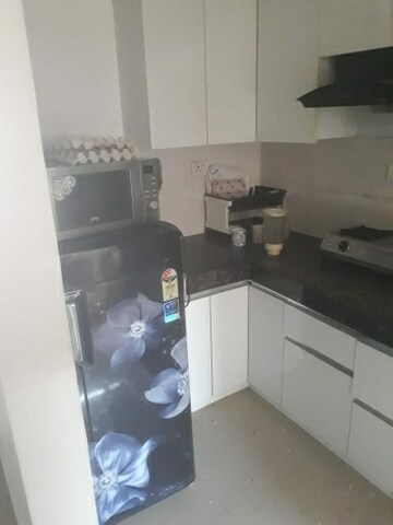 Kitchen in 2 BHK Apartment at VVIP Addresses, Raj Nagar Extension – for Rent