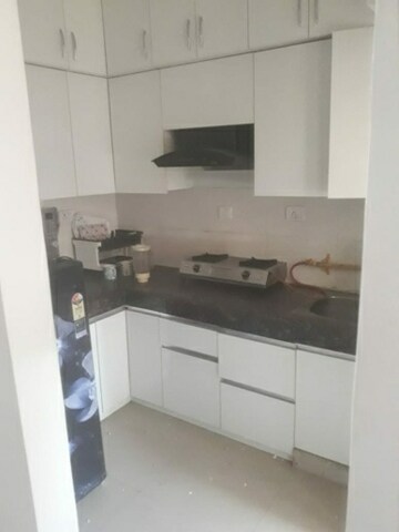 Kitchen in 2 BHK Apartment at VVIP Addresses, Raj Nagar Extension – for Rent
