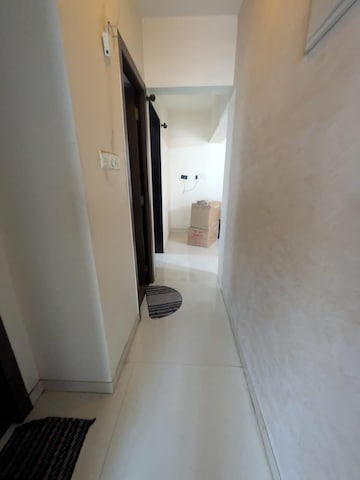 Building Lobby in 1 BHK Apartment at Tharwani Miracle, Kalyan West – for Rent
