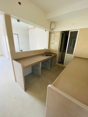 Kitchen in 1.5 BHK Apartment at Dosti West County, Balkum Pada – for Sale