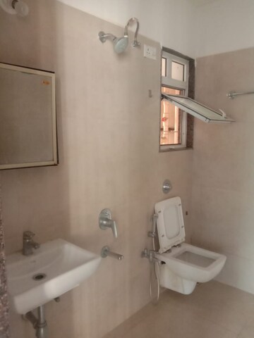 Bathroom in 2 BHK Apartment at Dedhia Platinum Lawns, Ghodbunder Road – for Rent