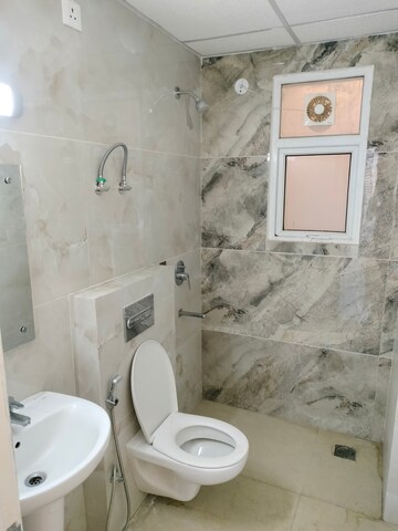 Bathroom in 3 BHK Apartment at Omaxe The Palace, Gomti Nagar – for Rent