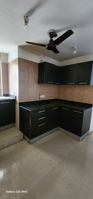 Kitchen in 2 BHK Apartment at Puri Pranayam, Sector 82 – for Sale