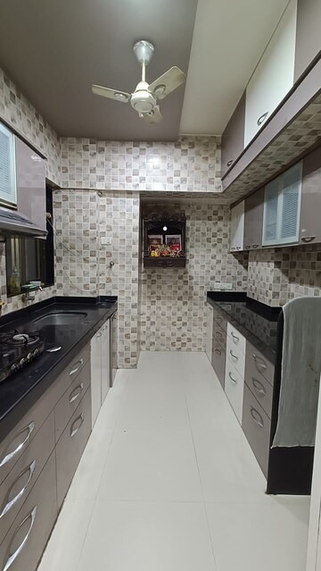 Kitchen in 2 BHK Apartment at Naupada – for Sale