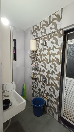 Bathroom in 2 BHK Apartment at Naupada – for Sale