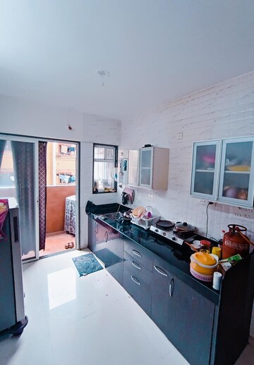 Kitchen in 2 BHK Apartment at Shree Sankalp The Legend, Hinjewadi – for Rent