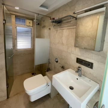 Bathroom in 4 BHK Apartment at Mahindra Gardens, Udyog Nagar – for Rent
