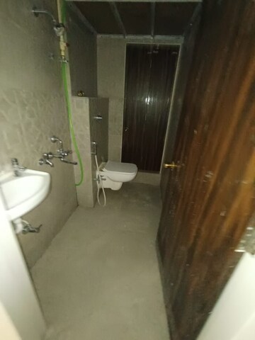 Bathroom in 3 BHK Apartment at Satish Dham CHS, Charai – for Rent