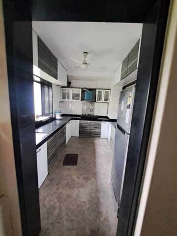Kitchen in 3 BHK Apartment at Damani CHS, Naupada – for Rent