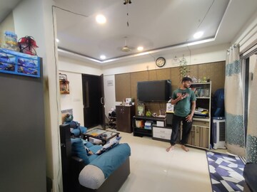 Living Room in 2 BHK Apartment at Raheja Township, Malad East – for Rent
