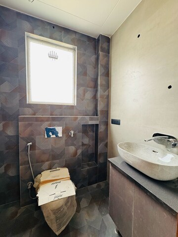 Bathroom in 3 BHK Builder Floor at Ansal Api Versalia 2, Sector 67a – for Sale